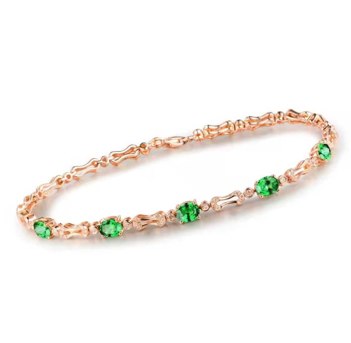 18K gold tsavorite diamond bracelet with 1.77 carat natural green tsavorite and elegant link design