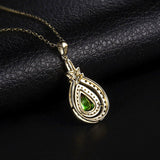 14K Yellow Gold 0.71ct Tsavorite Pendant with Natural Diamond