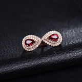 14kt Rose Gold 1.00ct Ruby Earrings with Natural Diamonds