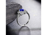 14Kt White Gold 0.83 ct Sapphire Ring with Natural Diamonds