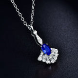 14kt White Gold Diamond 0.17 ct Blue Sapphire Pendant