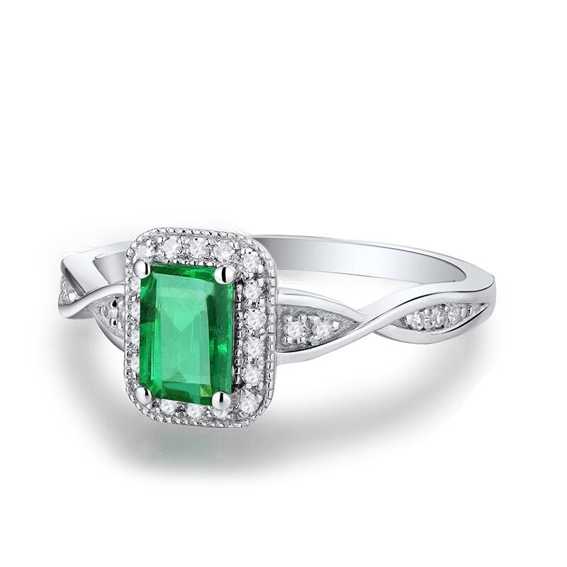 18Kt Gold Diamond 0.65 ct Emerald Ring