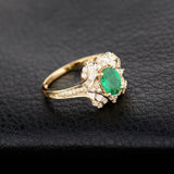 18Kt Gold Natural Diamond & 0.59ct Emerald Ring