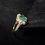 18Kt Gold Natural Diamond & 0.59ct Emerald Ring