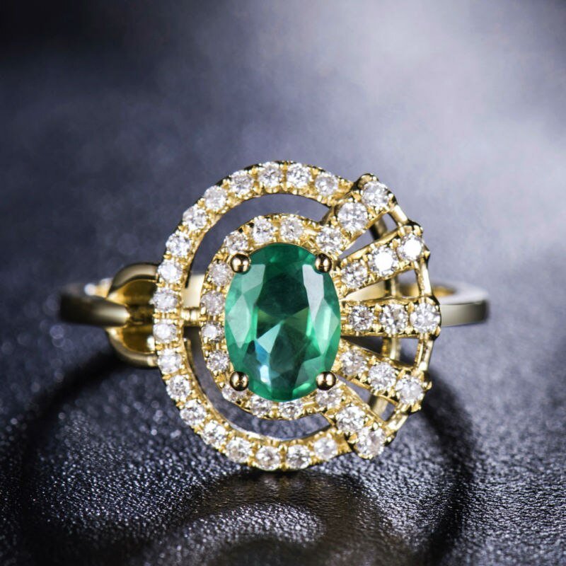 18Kt Gold Natural Diamond & 0.70 ct Emerald Ring