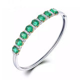 18Kt White Gold 5.86 ct Emerald Bracelet with Diamonds