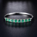 18Kt White Gold 5.86 ct Emerald Bracelet with Diamonds