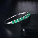 18Kt White Gold 5.86 ct Emerald Bracelet with Diamonds