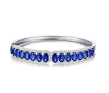 18kt White Gold Bracelet with 8.00 ct Blue Sapphires & 0.86 ct Diamonds – Oval Cut