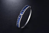 18kt White Gold Bracelet with 8.00 ct Blue Sapphires & 0.86 ct Diamonds – Oval Cut