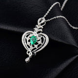 18Kt White Gold Diamonds 0.78 ct Emerald Pendants