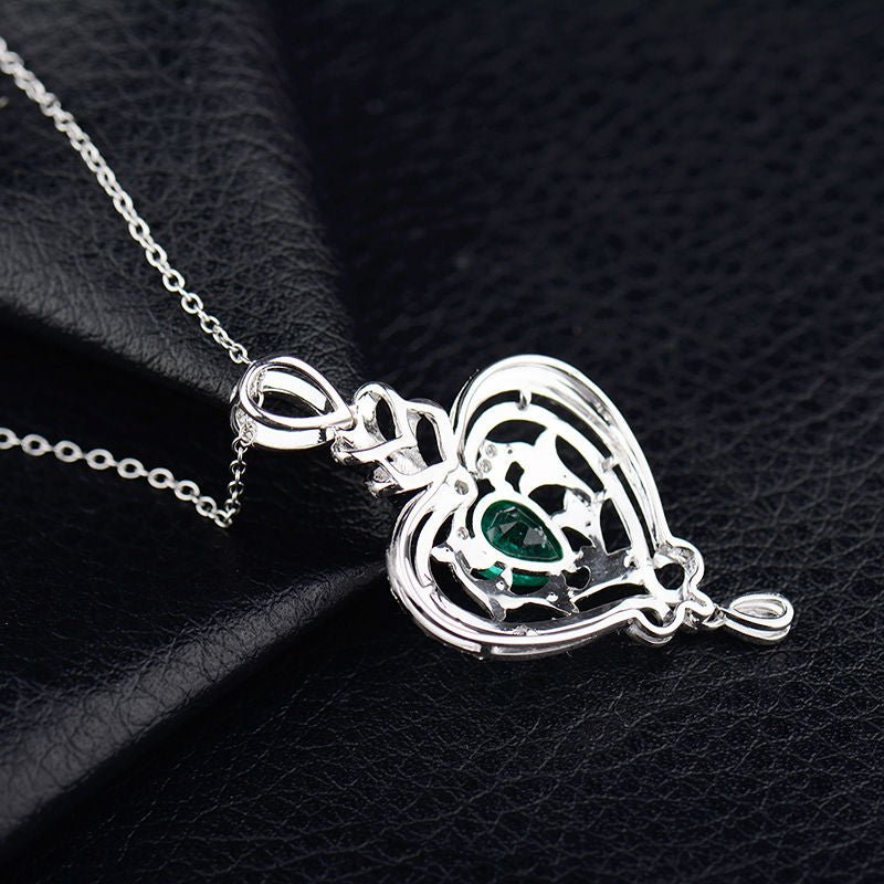 18Kt White Gold Diamonds 0.78 ct Emerald Pendants