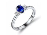 18Kt White Gold 0.70ct Sapphire Ring with Natural Diamonds