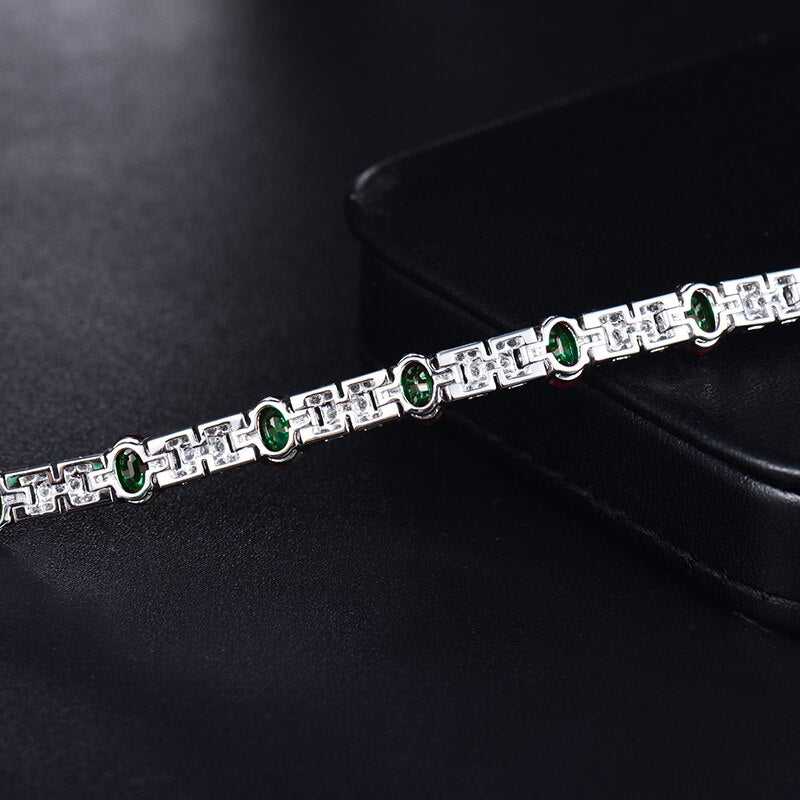 18Kt White Gold 7.61 ct Emerald Bracelet with Diamonds (Unisex)