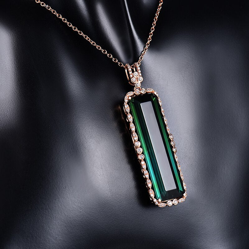 Přívěsek z 18kt růžového zlata s 23,29 ct zeleným turmalínem 