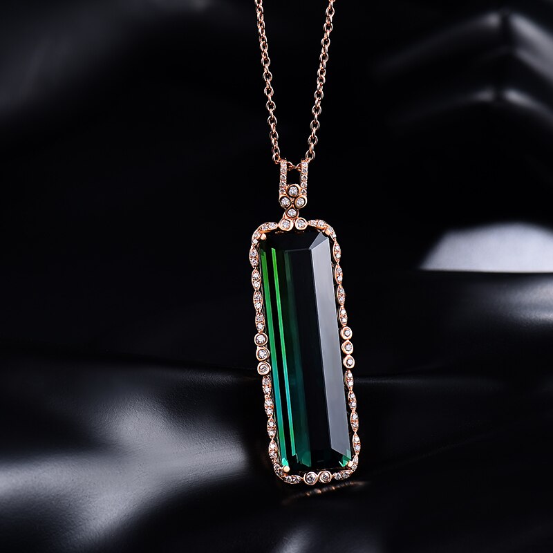 Přívěsek z 18kt růžového zlata s 23,29 ct zeleným turmalínem 