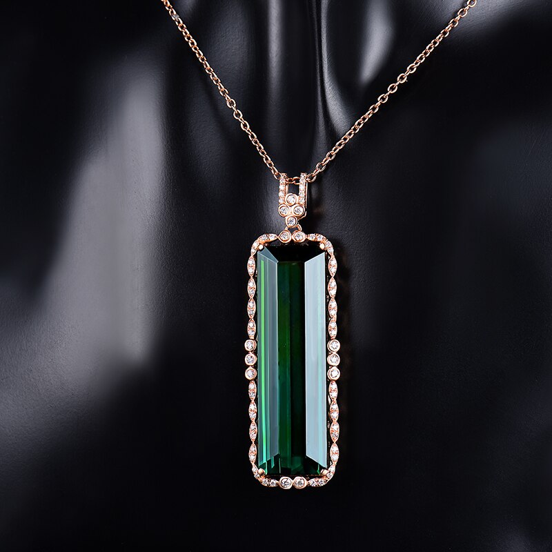 Přívěsek z 18kt růžového zlata s 23,29 ct zeleným turmalínem 