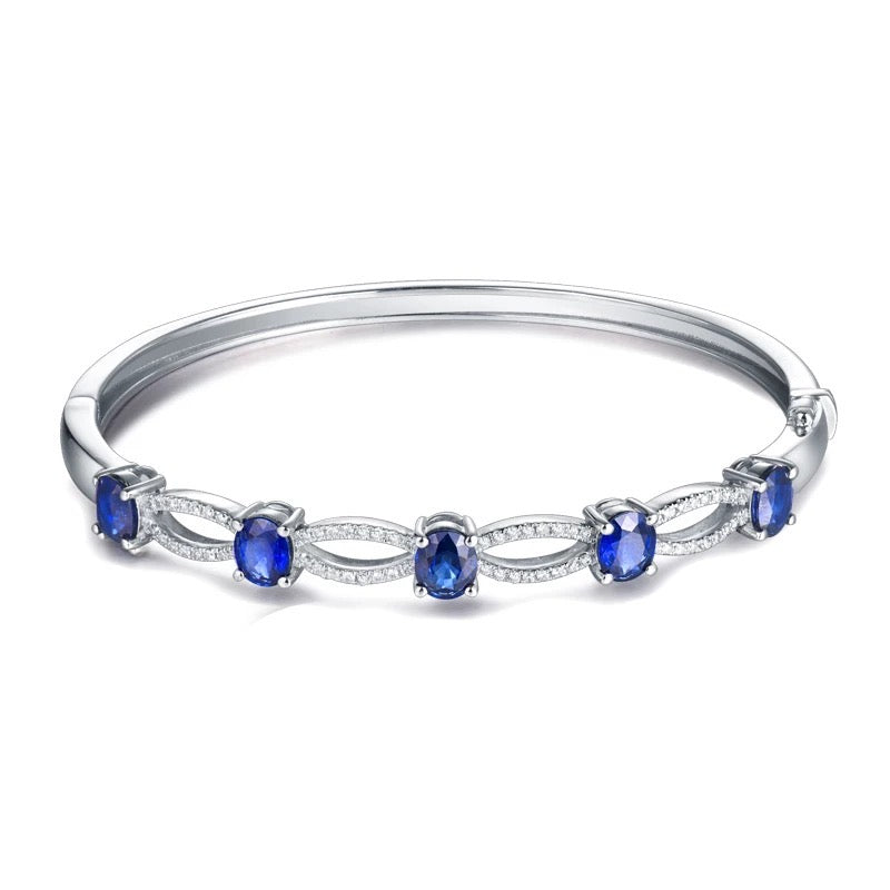 Náramek z bílého zlata 18kt s 2,50 ct safírem a diamanty 0,76 ct 