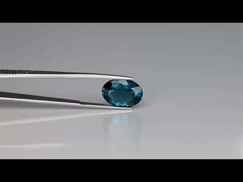 6.12 ct greenish-blue topaz in oval cut, eye-clean clarity, natural gemstone